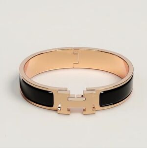 Black and Gold Hermes Clic H Bracelet